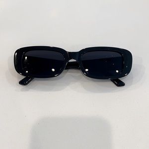 one pair of cute black rectangular sunglasses